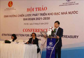 Tổng giám đốc Kho bạc Nhà nước Tạ Anh Tuấn phát biểu khai mạc hội thảo (Ảnh: TTXVN)